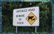 Unfenced Road warning sign